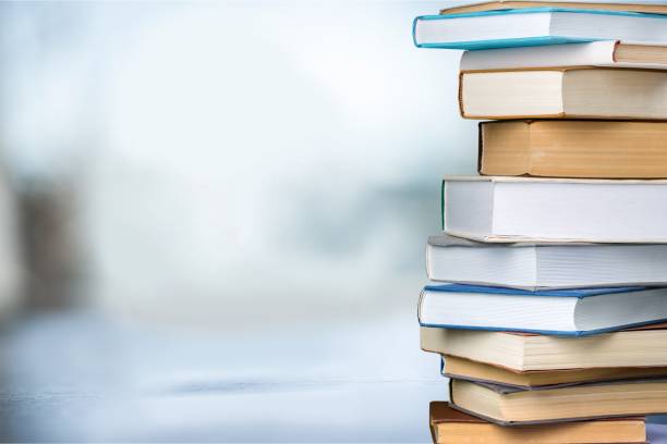 Books. Books collection in pile on  background. book stock pictures, royalty-free photos & images