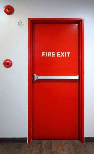 istock Fire exit emergency door red color metal material with alarm 698742492
