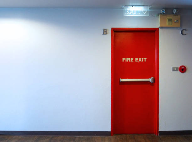 istock Fire exit emergency door red color metal material with alarm 698742510