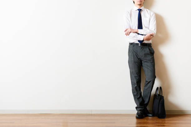 istock Businessman standing in the room 698746036