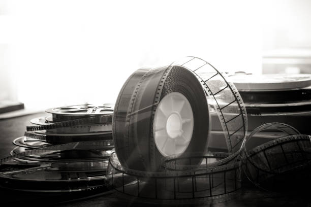 istock Past time movie symbol, 35 mm film reel evocative objects 698763644