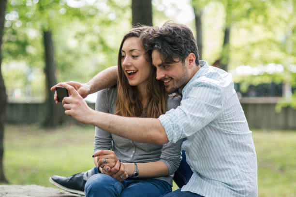 istock Taking photos in the park 698764538