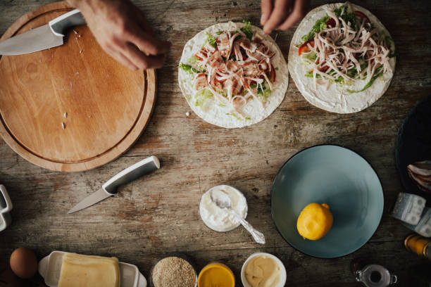 istock Preparation of wrap sandwiches 698766142