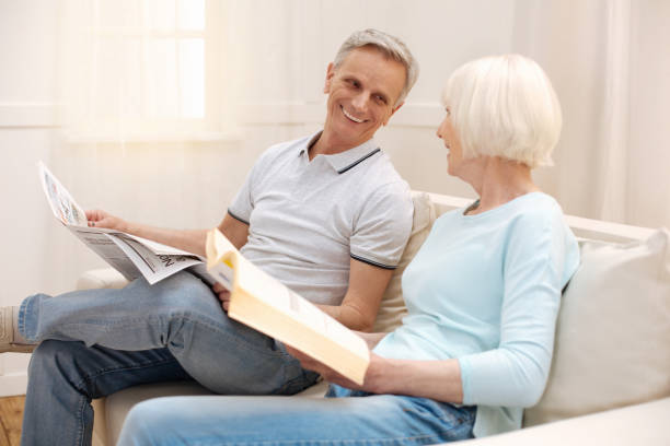 istock Bright sociable couple having a pleasant conversation 698768998