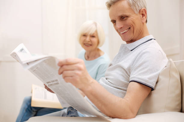 istock Positive productive couple enjoying informative morning together 698772206