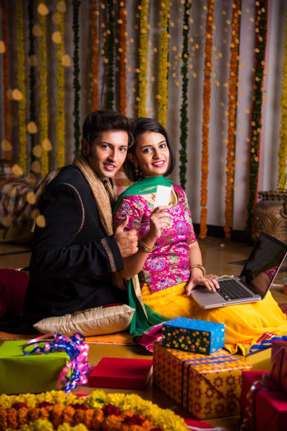 istock Indian young couple celebrating diwali 698778680