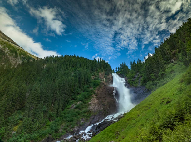 A fine day in the Austrian alps. Wonderful panorama in the summer. The largest waterfall in Austria.