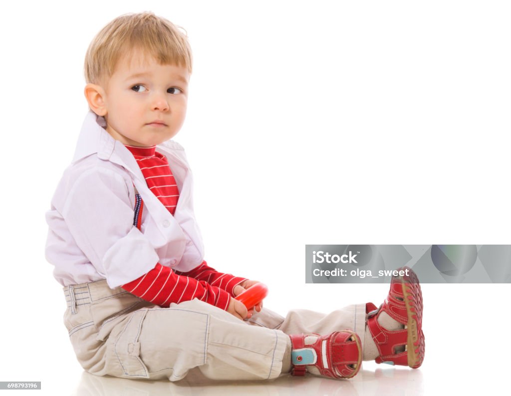 Boy Two years Boy sitting sad isolated on white Boys Stock Photo