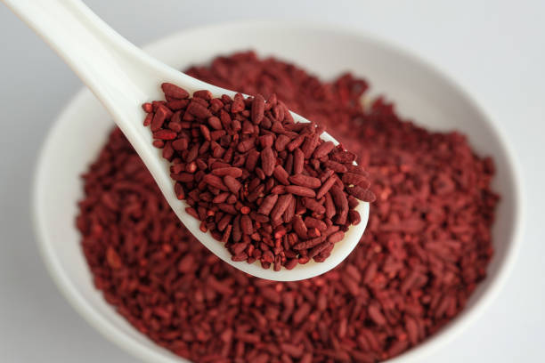 Red yeast rice Dried fermented red yeast rice is one of the famous oriental cooking ingredients. It's also to give natural red color without harm to health. yeast stock pictures, royalty-free photos & images
