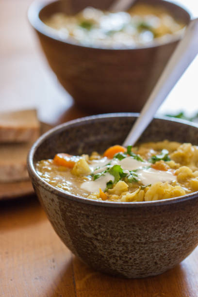 istock Rustic bowls with a hearty vegetable & lentil soup 698808058