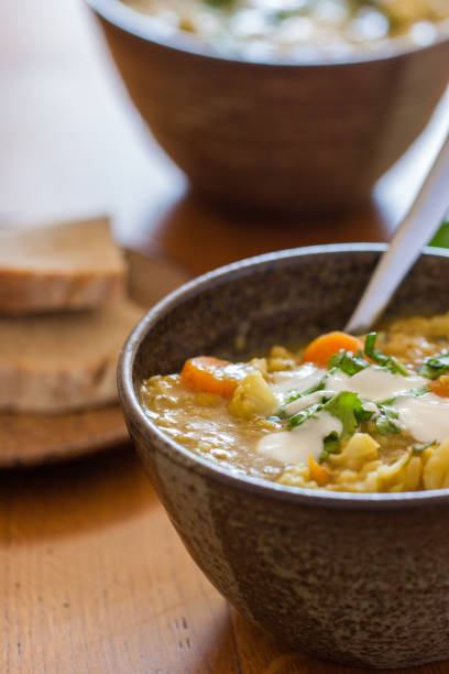istock Rustic bowls with a hearty vegetable & lentil soup 698808074