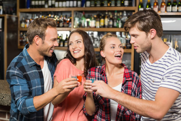 istock Friends toasting with shots 698808926