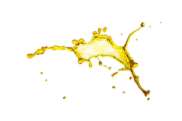 istock beautiful yellow liquid splash isolated over white background 698828584