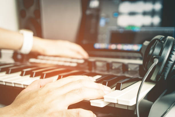 istock Musician is recording Music on Desktop studio 698831346