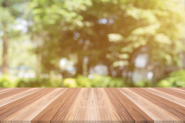 istock table top on blurred background,Space for placing product 698834294