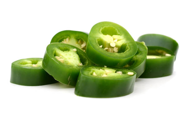 istock finely chopped chilli peppers on row 698834860
