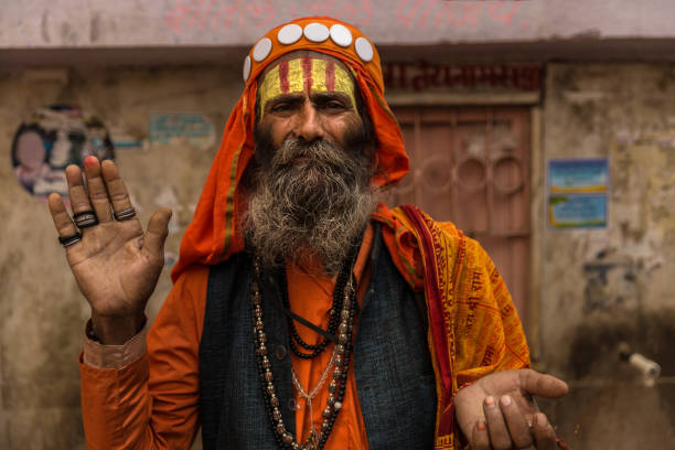 Sadhu in Pushkar, India A sadhu also spelled saddhu, is a religious ascetic, mendicant (monk) or any holy person in Hinduism and Jainism who has renounced the worldly life. prayagraj photos stock pictures, royalty-free photos & images