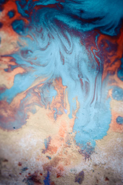 istock Abstract background with blots and spreads droplets of different colors 698857390