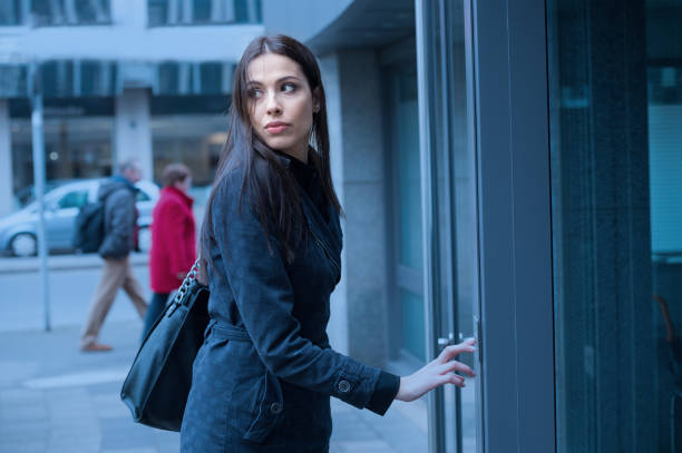 istock Woman pressing button, worried 698861858