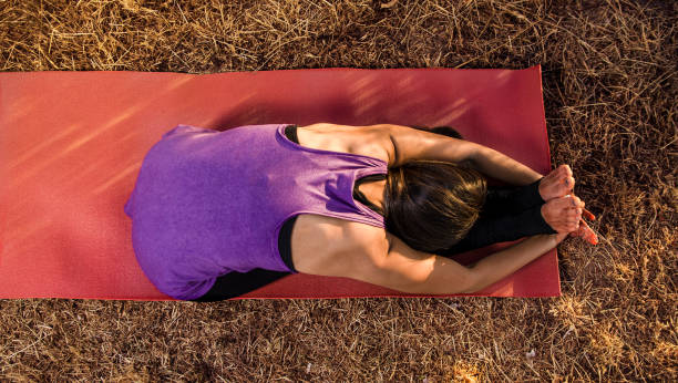 istock Top view, woman stretching outdoors 698862470