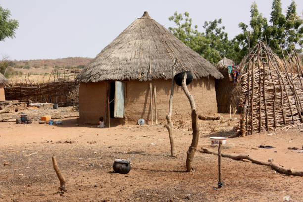 istock African village huts 698878040