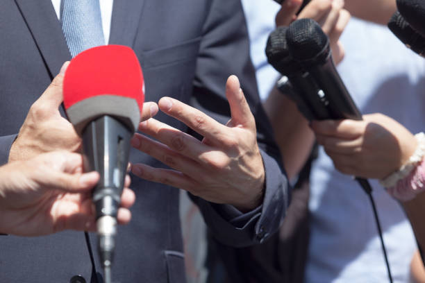 istock TV, media or press interview with business person 698878196