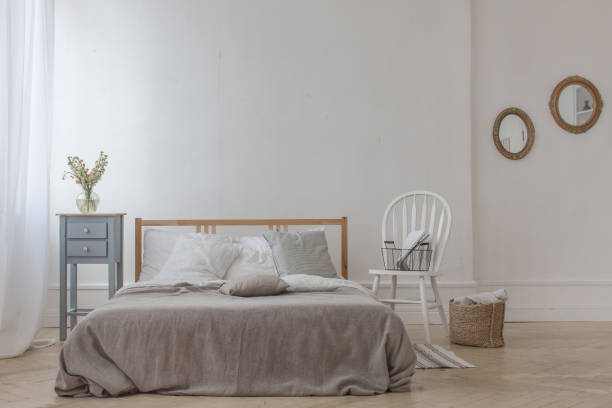 istock Interior of white and gray cozy bedroom 698895212