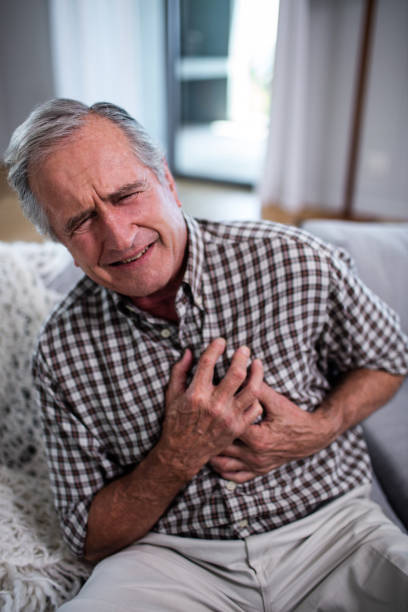 istock Senior man suffering from heart attack 698896022