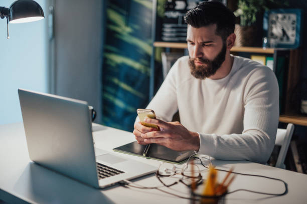 istock The man sent a text message to the girl that he will work late 698903888