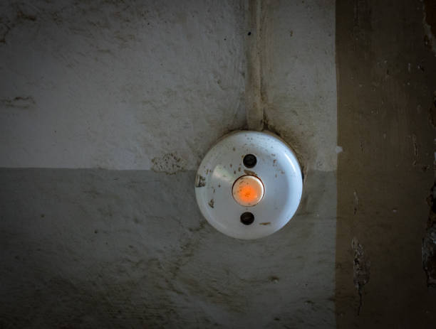 istock The old and ancient bell on a wall 698911350