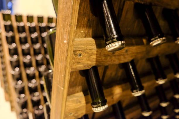 istock Traditional method of making sparkling wine Champagne in winery 698923478