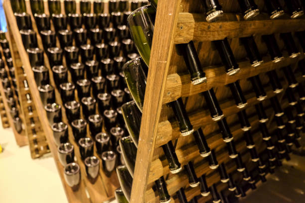 istock Traditional method of making sparkling wine Champagne in winery 698924324