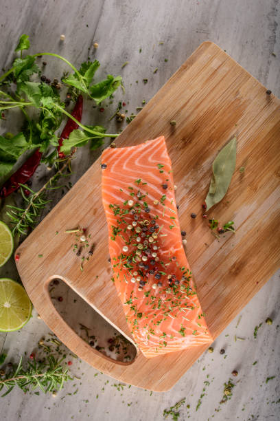 istock Raw Salmon Steak with Sea Salt and Spices, Herb 698936586