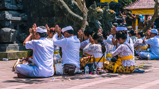 GOA LAWAH, BALI, INDONESIA - November 3, 2016: Balinese praying on ceremony at Pura Goa Lawah temple, Bali - Indonesia.