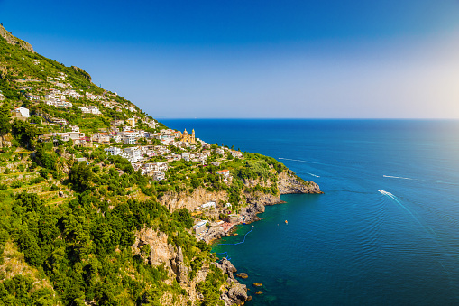 Scenic picture-postcard view of famous Amalfi Coast with Gulf of Salerno in beautiful evening light, Campania, Italy