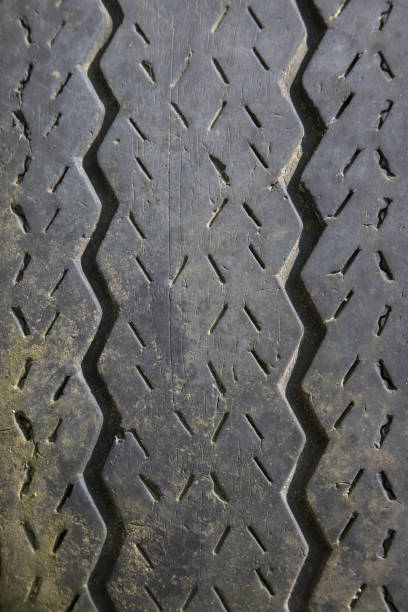 istock Automotive tire tread abstract 698963196