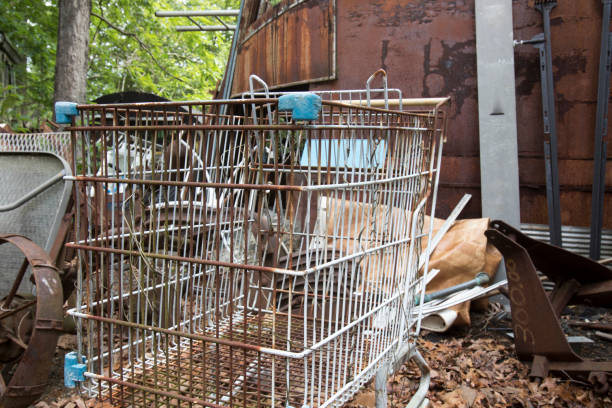 istock Rusting shopping cart in junkyard 698974536