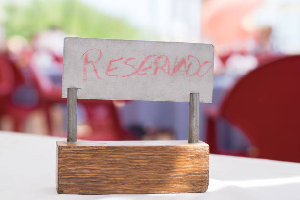 istock Reserved sign handwritten in spanish. 699056026