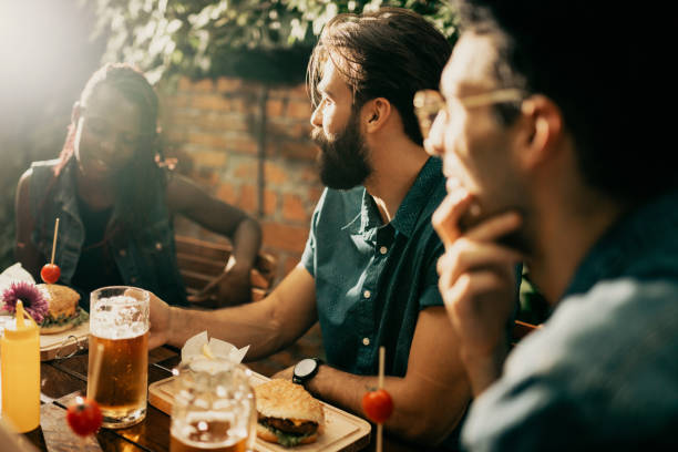 istock Friends at the pub having a meal together 699087860