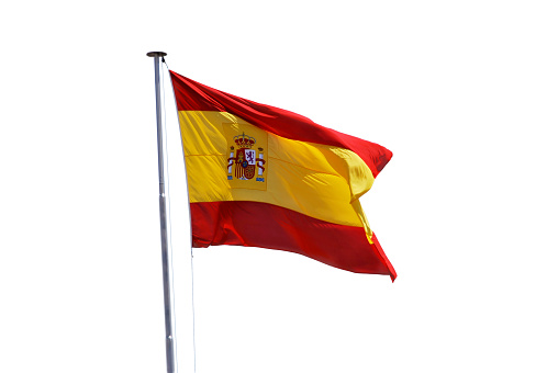 Flag of Spain waving on the wind isolated over white