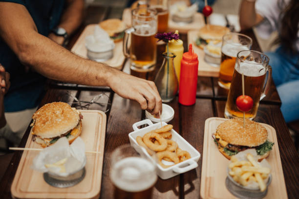 istock Group of people having lunch at the restaurant 699097638