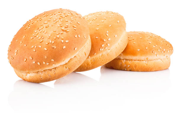 istock Three hamburger buns with sesame isolated on white background 699098550