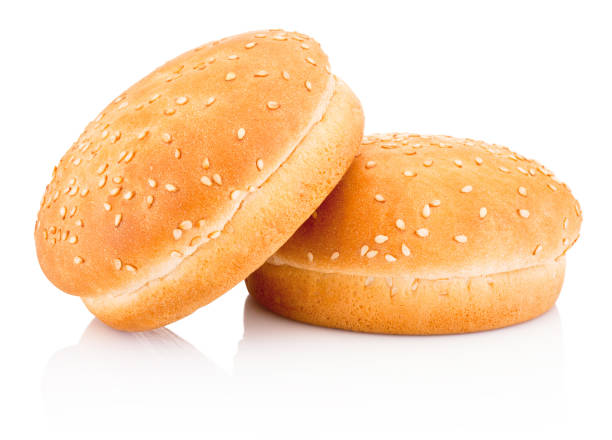 istock Two hamburger buns with sesame isolated on white background 699099414