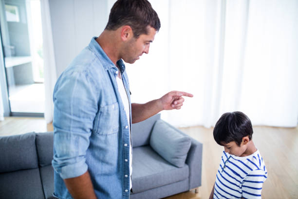 istock Angry father scolding his son 699115898