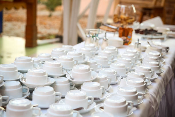 istock tea sets, collection white coffee cups, buffet, catering 699116878