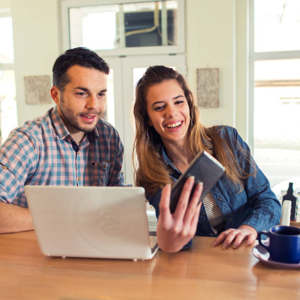 istock Catching memories by stylish young couple 699125694