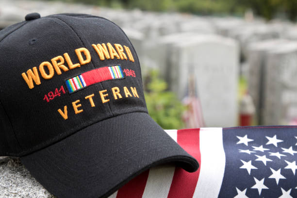 istock World War Two Cap in cemetery. Close-Up 699132728