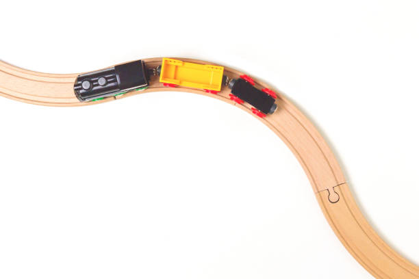 istock Toy train and wooden rails on white background. Top view. Copy space for text 699133484