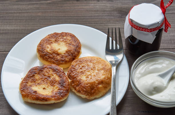 istock pancakes on a white plate on a dark table 699142234