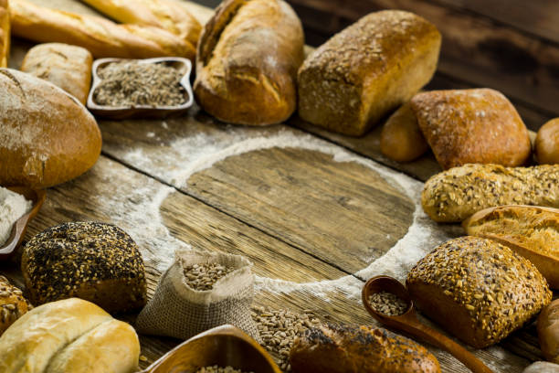 istock Many mixed breads and rolls shot from above. Bakery Background 699147760
